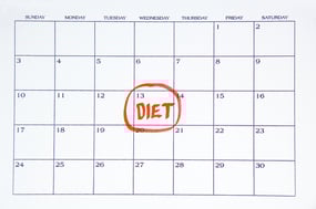 DIET written in red on white calendar