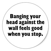 banging_your_head_against_a_brick_wall_sticker-p217367976180528591z8j38_400